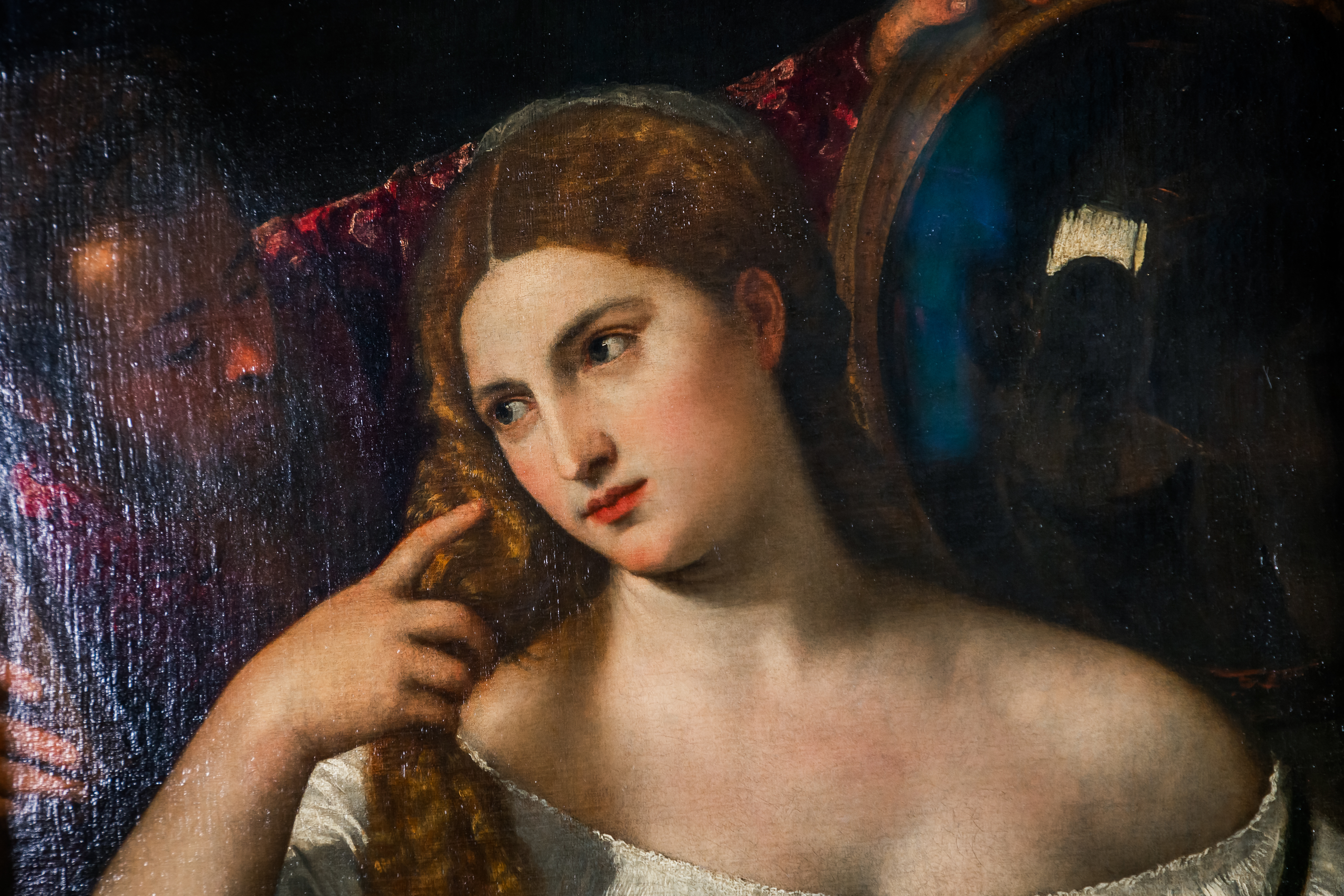 "La Femme au miroir" (1525/1550) by Titian, showcased at the Louvre as part of De Toutes Beautés!, an exhibition made possible through L’Oréal’s cultural mediation, celebrating the timeless dialogue between art and beauty. Photo by Nicolas Romieu. Courtesy of L'Oréal Groupe 